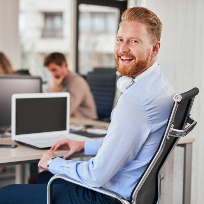 Administration professional working in open-plan office environment